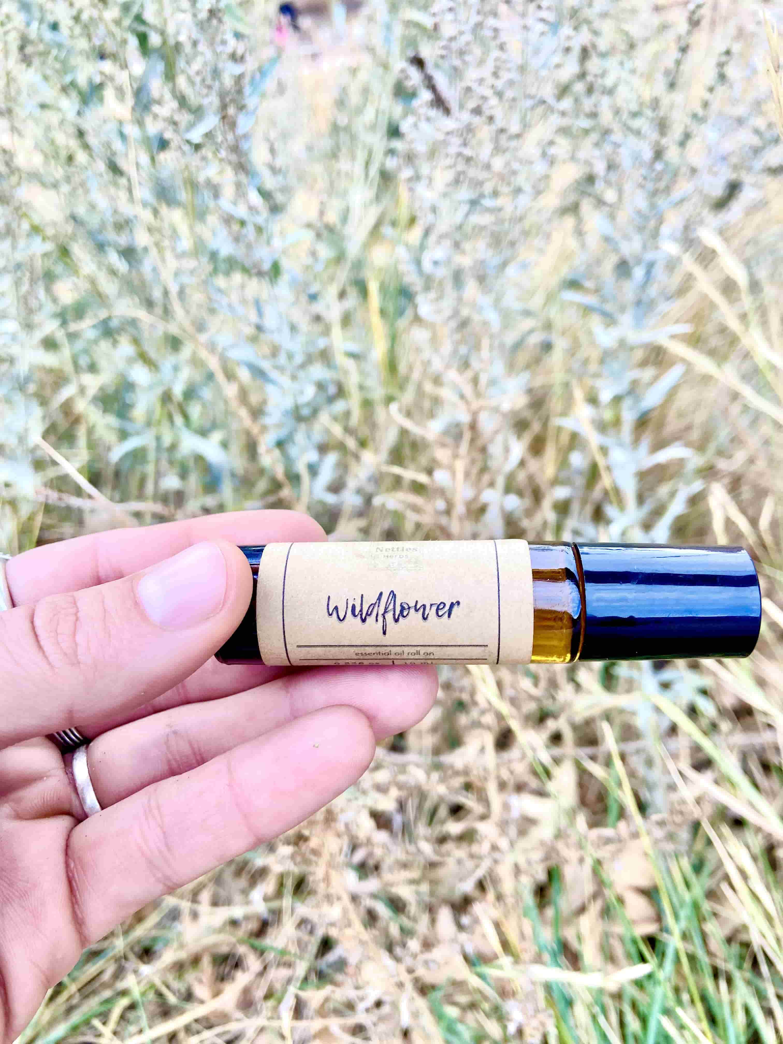 Wildflower Essential Oil Roll On. Blended with grounding Frankincense, calming Lavender, uplifting Bergamot, & mental stimulating Rosemary, this 100% pure, therapeutic grade roll on stimulates your senses & promotes peace & happiness.